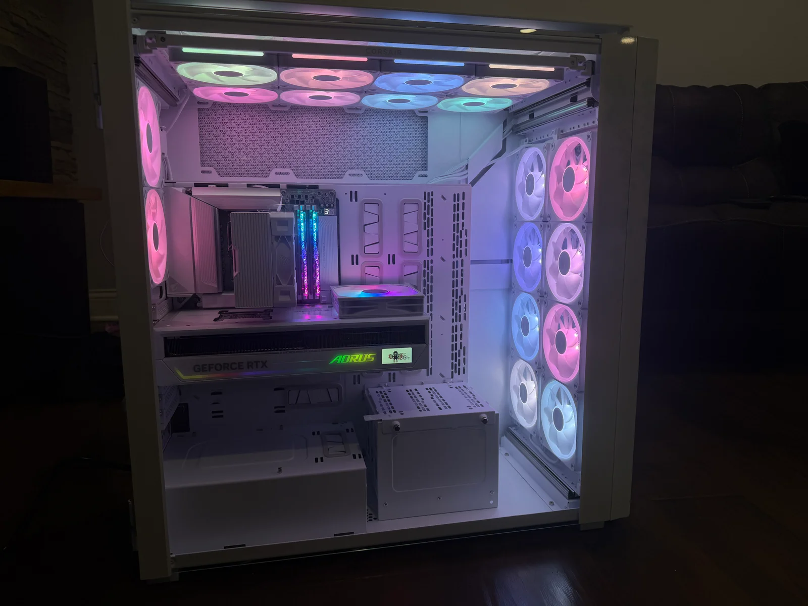 Completed air-cooled Phase-1 simulator PC with a white chassis, installed GPU, and controllable fan layout.